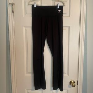 Adidas Black Leggings with seam and slit in the front for fun movement!